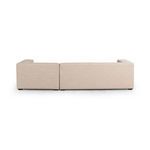 Back view of the sectional displaying clean lines and tight upholstery on the back panels