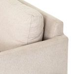 Close detail from back, showing removable cushion fit and fabric stitching on backrest