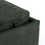 Close-up showing top seam detail on back cushions with piping trim