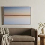Horizon metal print styled in a living room with beige couch and natural decor
