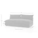 Rear view of Grant armless sectional piece showing clean, unadorned upholstery in dark charcoal fabric