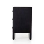 Straight side profile showing smooth black wood surface and dresser legs