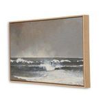 Angled side view showing thickness and wood grain texture of picture frame around ocean wave painting
