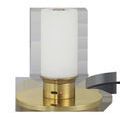 Battery charging station with lamp diffuser lit on a round brass charging plate with a USB cable