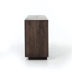 Sideboard depth perspective from narrow end highlighting wood panel joins