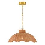Scalloped Serenity Rattan Pendant illuminated with warm light through woven rattan texture