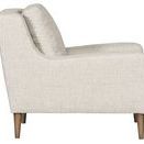 Josie Accent Chair side profile displaying cushioned seat and tapered wood leg details