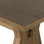 Detailed view of edge profile of tabletop with natural oak finish and clean lines