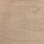 Macro image showing stitching detail and fiber direction on plush upholstery