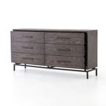 Another close-up low angle on iron base design and wood texture on drawer fronts