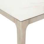 Close detail of corner where the Dekton top meets the light wood frame