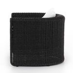 Left side profile showcasing smooth rounded wicker frame and cushion depth