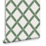 Rolled section of Greenskeeper wallpaper highlighting texture and repeat of lattice pattern