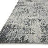 Low angled side view emphasizing the rug’s thin profile and dense flat weave texture