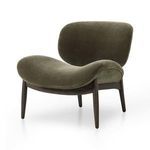 Side angle view showing plush cushioning and contours of olive chenille upholstery on the chair