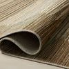 Folded edge close-up displaying the flexible polypropylene material and detailed weave of the rug