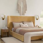 Pair of Happy Sconce Right Asymmetrical mounted over headboard in warm, cozy bedroom scene