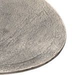 Detailed photo showcasing raw nickel base with soft reflective qualities and textures