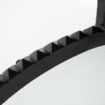 Close view of the mirror frame showing matte black ridged detailing