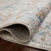 Rolled edge of Bianca rug exposing tightly woven polypropylene backing and plush surface