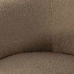 Detailed view of cushioned inner back curve and upholstery texture