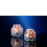 Two marbled brown and white vases lit from within against a dark blue background