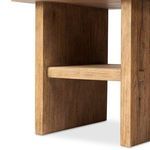 Close-up under view showing shelf thickness and paneled side of Zeno End Table