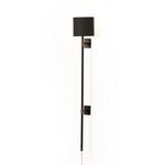 Rear side angle of Maurice Sconce showing backplate with visible on/off switch on brass arm