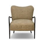 Tarah Chair with sweetheart-shaped back, brushed tan fabric upholstery, and slim hammered black metal frame