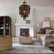 Modern Mood Rectangle Cocktail Table styled in a living room with sofa, armchair, rug, and chandelier