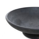 Close-up of Perla Bowl rim and textured aged black terracotta surface