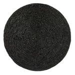 Top view showing circular woven texture pattern on black accent table