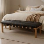 Costello Bench styled at foot of beige textured bed in softly lit bedroom environment
