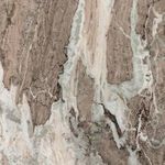 Close-up of variegated marble surface texture with beige, brown and gray veining