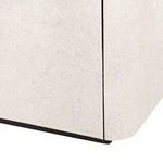Close-up of Andre cabinet corner showing hair-on-hide texture and black base edge
