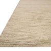 Close-up angled view showing ribbed texture and plush pile height of natural wool rug
