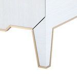 Close-up of tapered leg with platinum lacquered trim and textured pin-stripe silk grasscloth wrapping