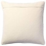 Back of pillow showing plain cream fabric with envelope closure