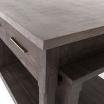 Top-down view of the corner of the concrete countertop and adjoining wooden frame