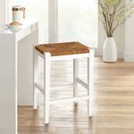 Haven stool placed on wood floor near counter with natural light and indoor plant in background