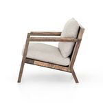 Side profile of Zoey Chair highlighting thick cushions and clean geometric frame lines