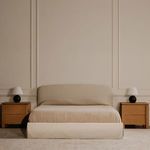 Two Brook nightstands flanking a beige upholstered bed in a neutral-toned room