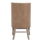 Back view of Duet Head Chair featuring tan upholstery on back and natural gray ash wood legs