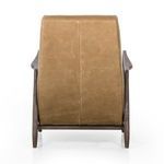 Front view of warm brown leather recliner with footrest partially extended