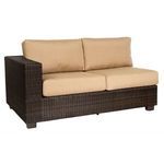 Dark brown wicker outdoor sectional sofa with beige cushions and wide armrest on left side