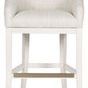 Front view of Ryder stool with natural wood tone footrest replacing the standard silver metal footrest