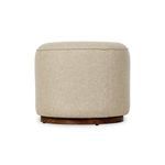 Rear view of Sinclair Outdoor Ottoman displaying smooth fabric and rounded shape