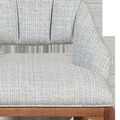 Close-up of Inga Stool seat and upholstered back showing textured fabric weaving