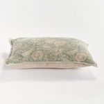 Side view of Pascaline Pillow showing thickness and natural linen-colored back
