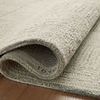 Rolled edge of Francis Silver / Sky Rug highlighting thickness and wool texture